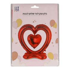 בלון ענק לצד שולחן - לב